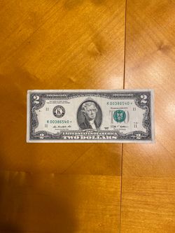 KRISPY $ 2 dlr. STAR NOTE AND OFF CENTER