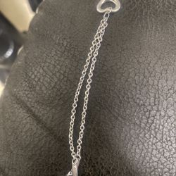 TIFFANY & CO OPEN HEART BRACELET. PRICE IS NEGOTIABLE!!!!
