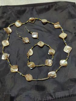 Set Of Necklace, Bracelet And Earrings. Shell Beads Style.