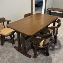 Wood Tables And Rolling Chairs