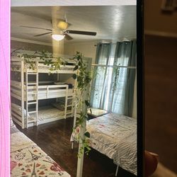 Triple bunk bed with mattress