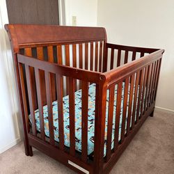 Crib with mattress and cover