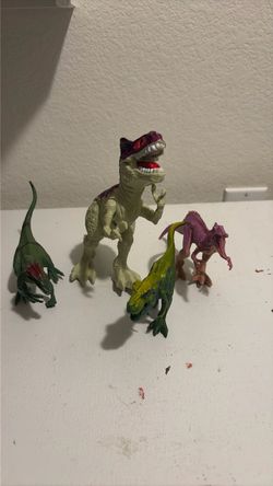 Lot of 4 Dinosaur Action Figures