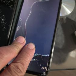 2 IPHONE XR BOTH HAVE CRACKED SCREENS 1 IS LOCKED $75