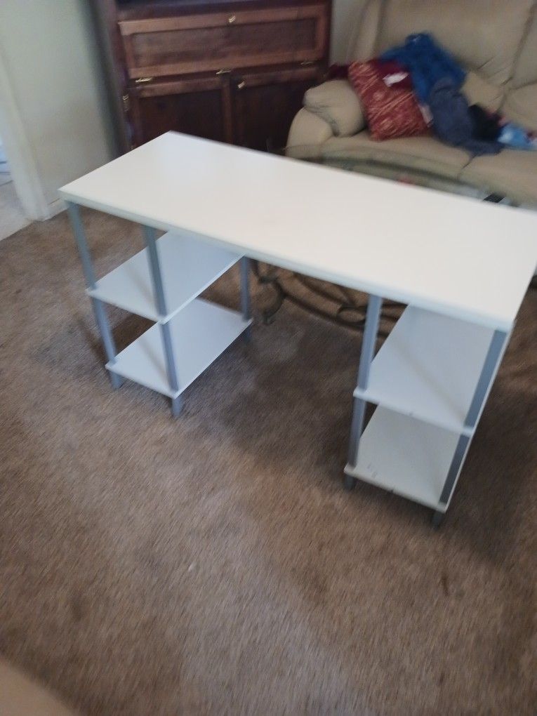 A White Desk And Chair For Kids.