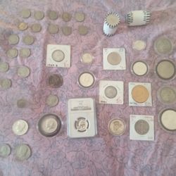 3morgans,1silvereagle,Eisenhower,silver 5proof 50c,4proof25c,couple errorcoins,miscellaneous older nickles 50c,and quarters,2unsearchedrollsof50c 