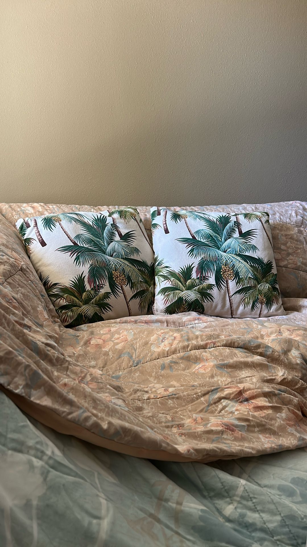 Two palm tree coconut themed cushions