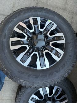 NEW - tires and rims for HD 2500. 20” wheels and tires