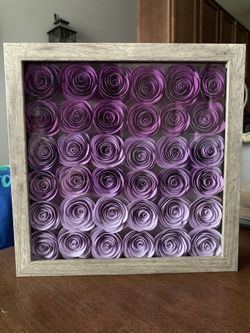 Paper flowers in a shadow box