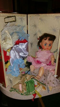 Old doll, case and lots of clothes shoes ect
