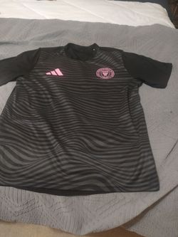 Club International De Futbol shirt with MESSI name on back