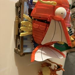 SDCC 2023 Mattel MEGA Pokémon Magikarp Motion Brick Building Set and charizard