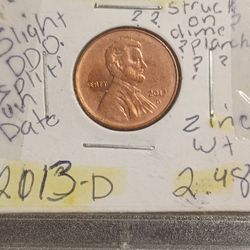 2001 Quarter Unplated on Obverse side Of Coin And 2013-d Strike Through Coin  Is