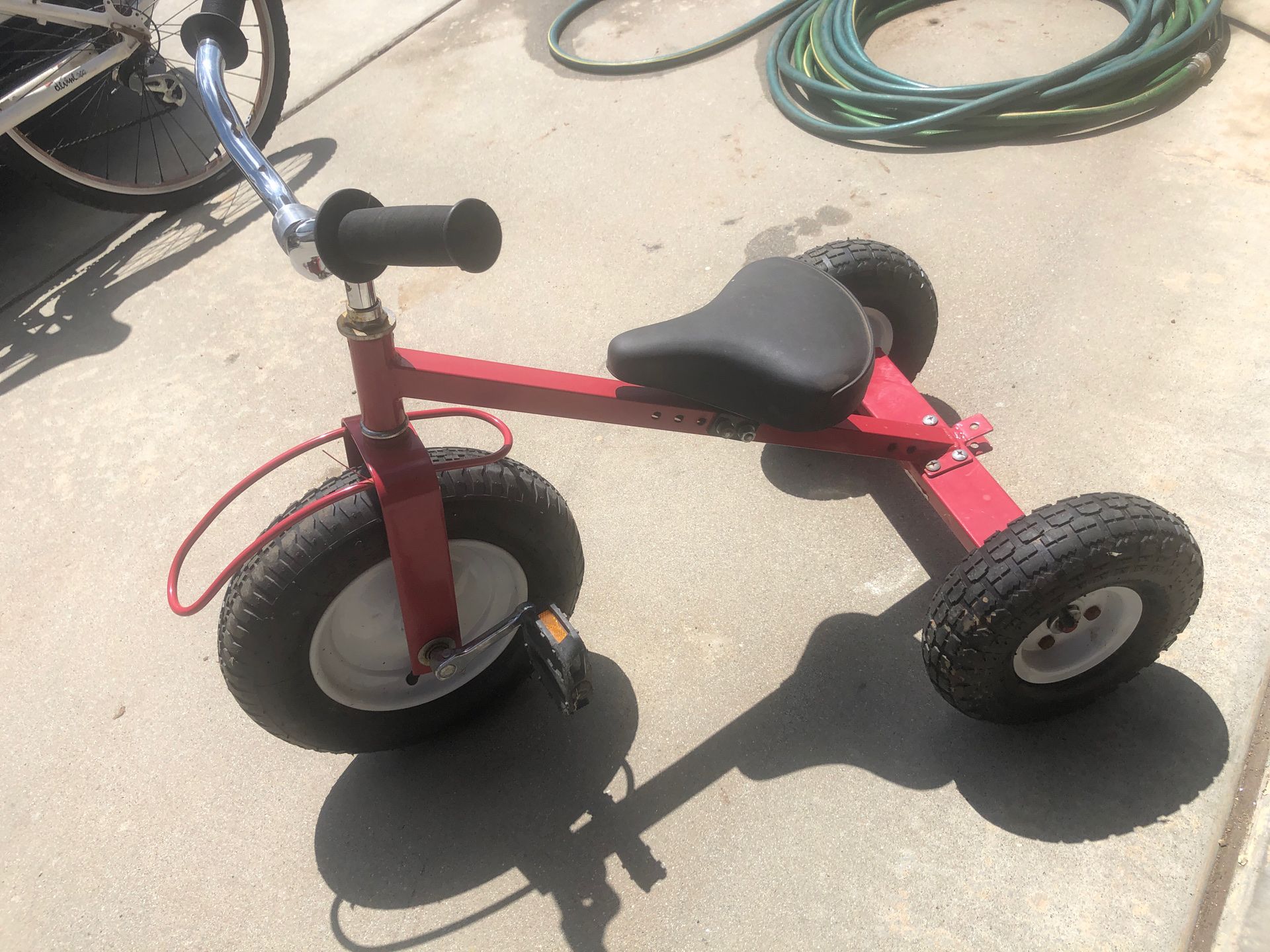 Red 3 wheeler tricycle / repair / $10