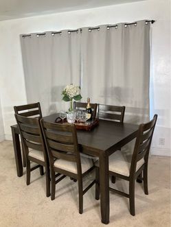 Ashley Furniture Dining Table with 6 Chairs