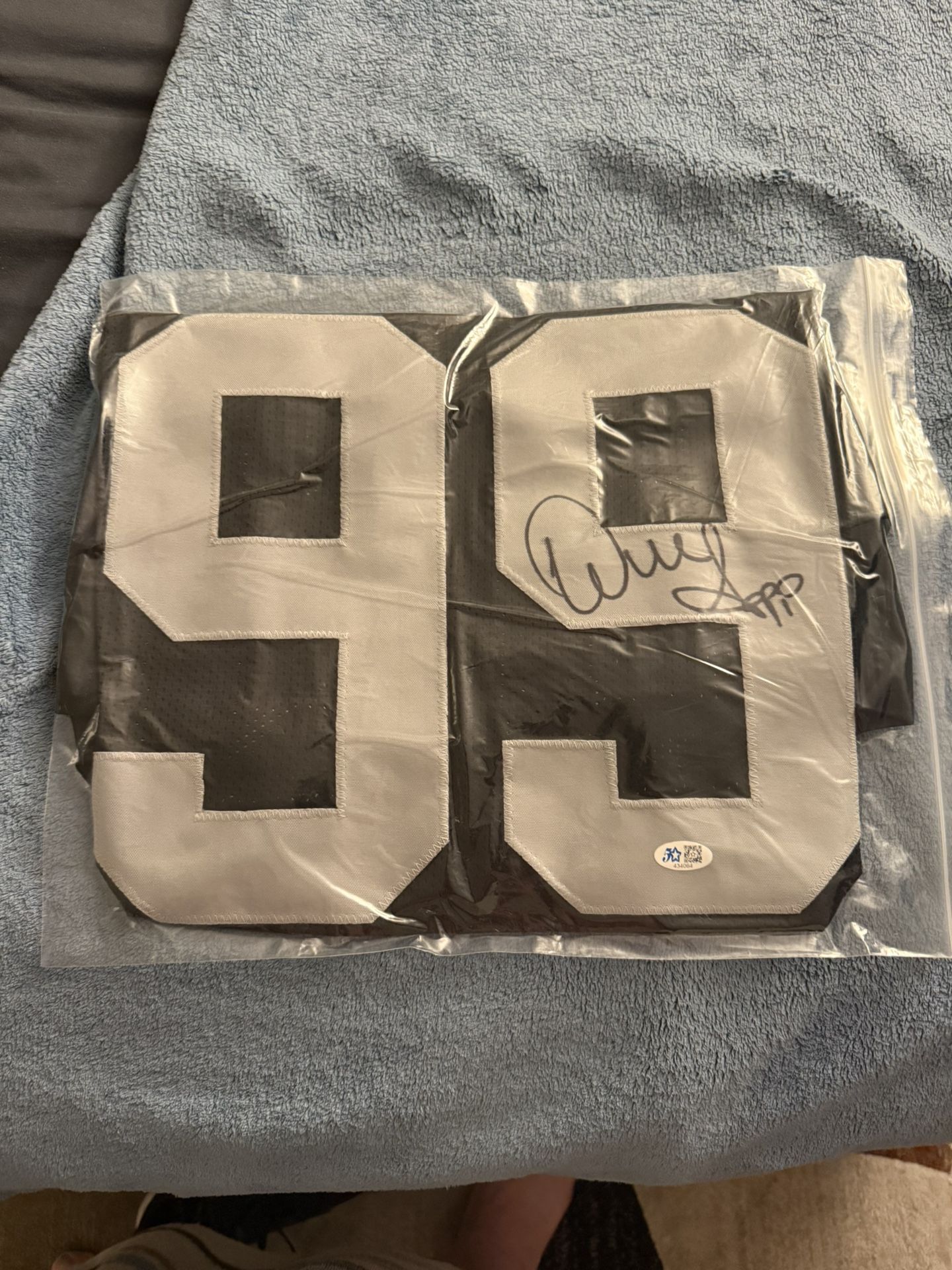 AUTOGRAPHED WARREN SAPP RAIDERS JERSEY