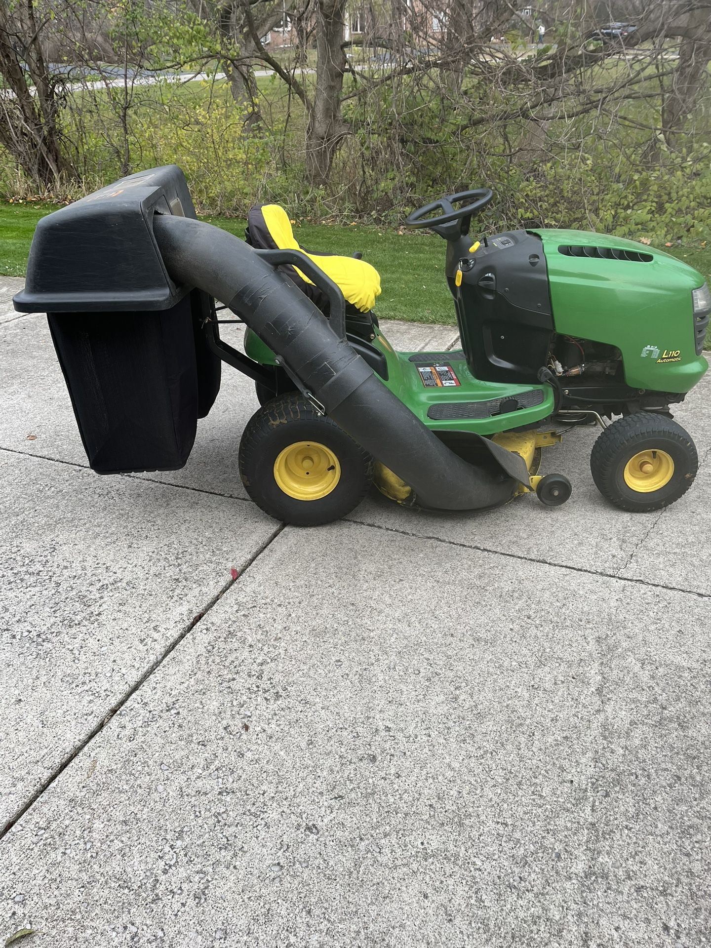 John Deere L110 Tractor With Bagger
