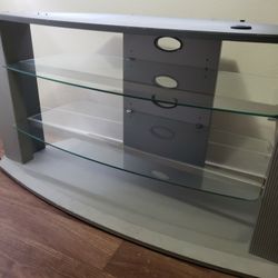 Entertainment Center 24 "Inches Tall X 47"Inches  Wide And  19 " Inches Deep With Glass Shelves 