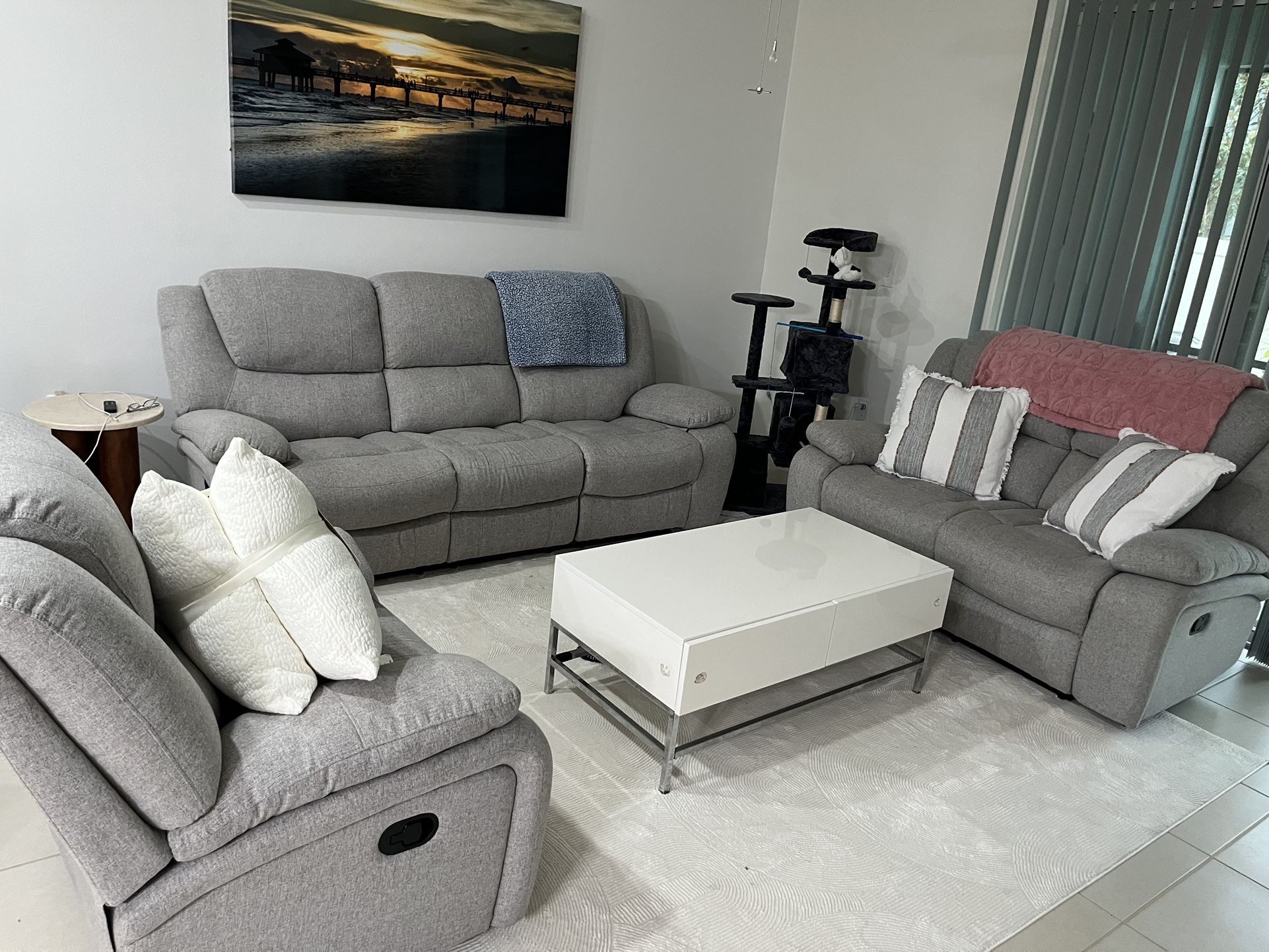 3 piece reclining gray cloth couch