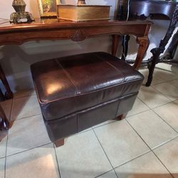 Leather ottoman 18"H x 25" L x 19" D