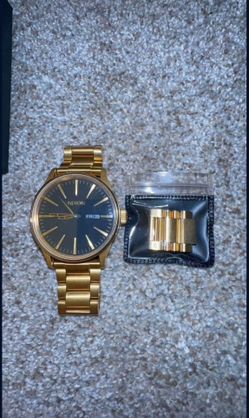 Gold Nixon Watch