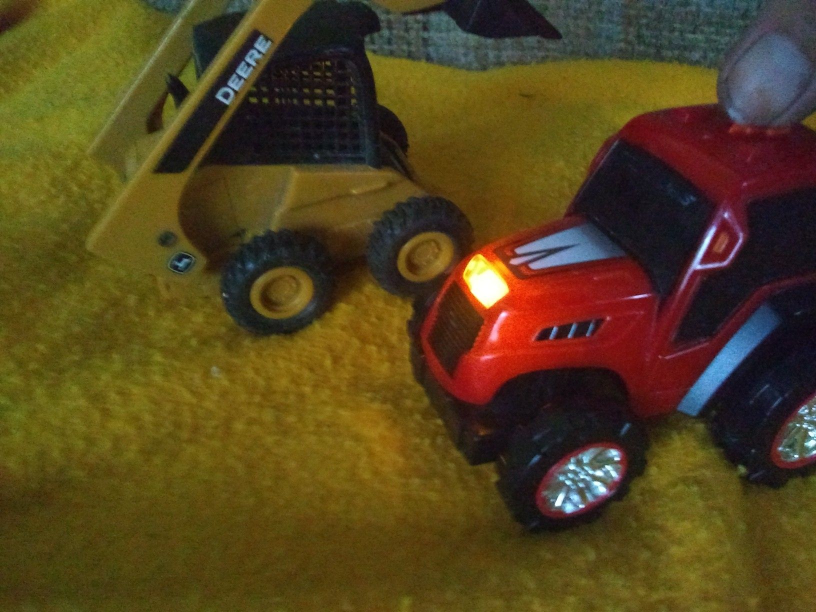 A John Deere mini front in loader & a road rippers tractor!