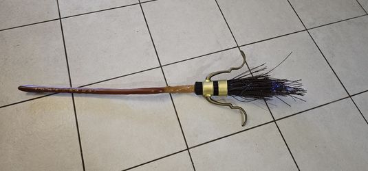 The Wizarding World of Harry Potter Firebolt Glowing Broomstick