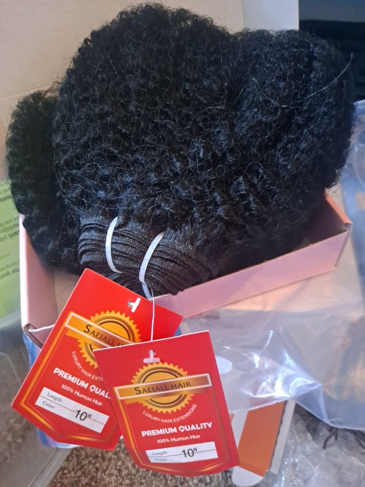 TWO BUNDLES OF REAL HAIR