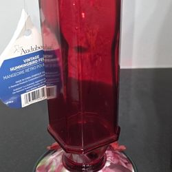 Red bottle hummingbird feeder 