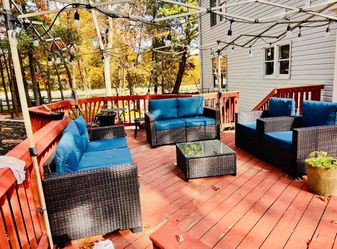 Outdoor furniture set with storage container