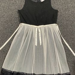 Emily West girls size 8 black dress with shimmery silver ivory tulle and black lace on hem