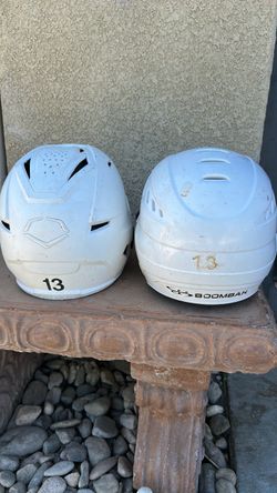 2 softball helmets