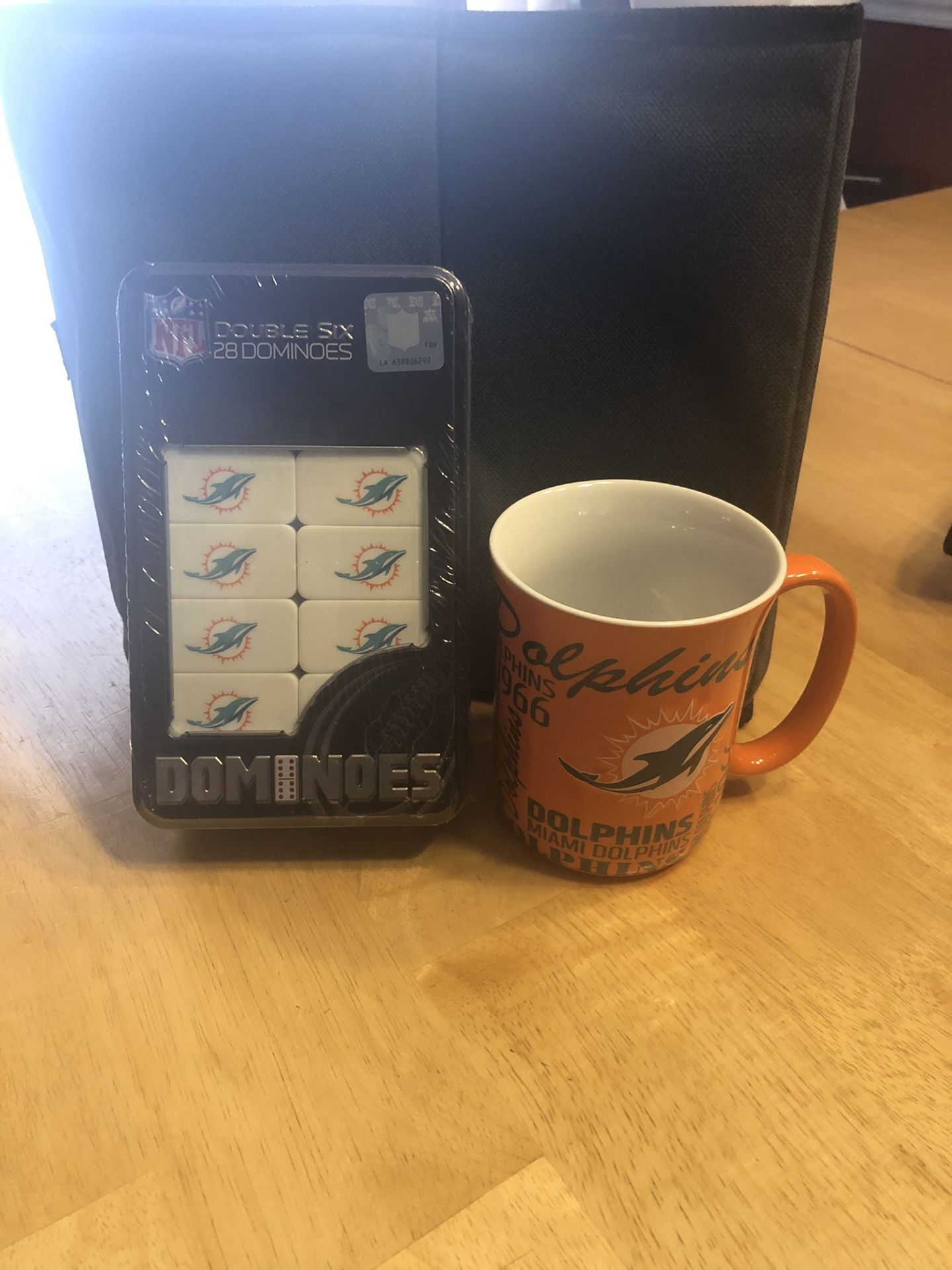 Miami Dolphins coffee mug and dominoes