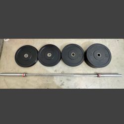 190lbs. Of Olympic Weights / Plus Olympic Barbell