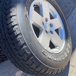 For Sale 5 OEM Jeep Wrangler Wheels 1 With New Tire And Set Of All Lug Nuts Located In Pueblo 700 OBO Will Deliver For Full Price 