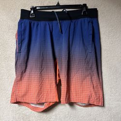 Lululemon THE Short Linerless 10” Mens Large Orange