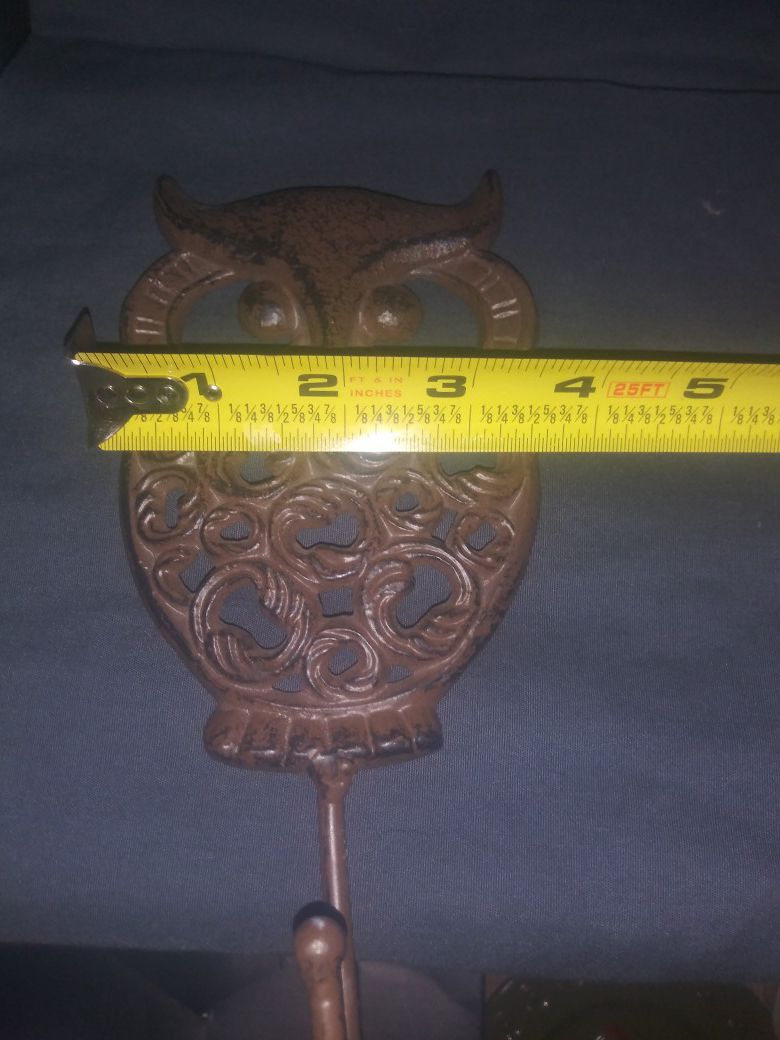 Cast iron owl coat hangong hook.$15 obo