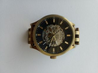 Gold Nixon the spectra skeleton watch