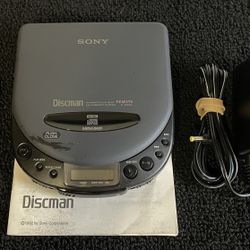 Sony DiscMan With Remote, AC Adapter, And Manual 