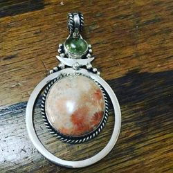 Fossilized coral set in silver $30