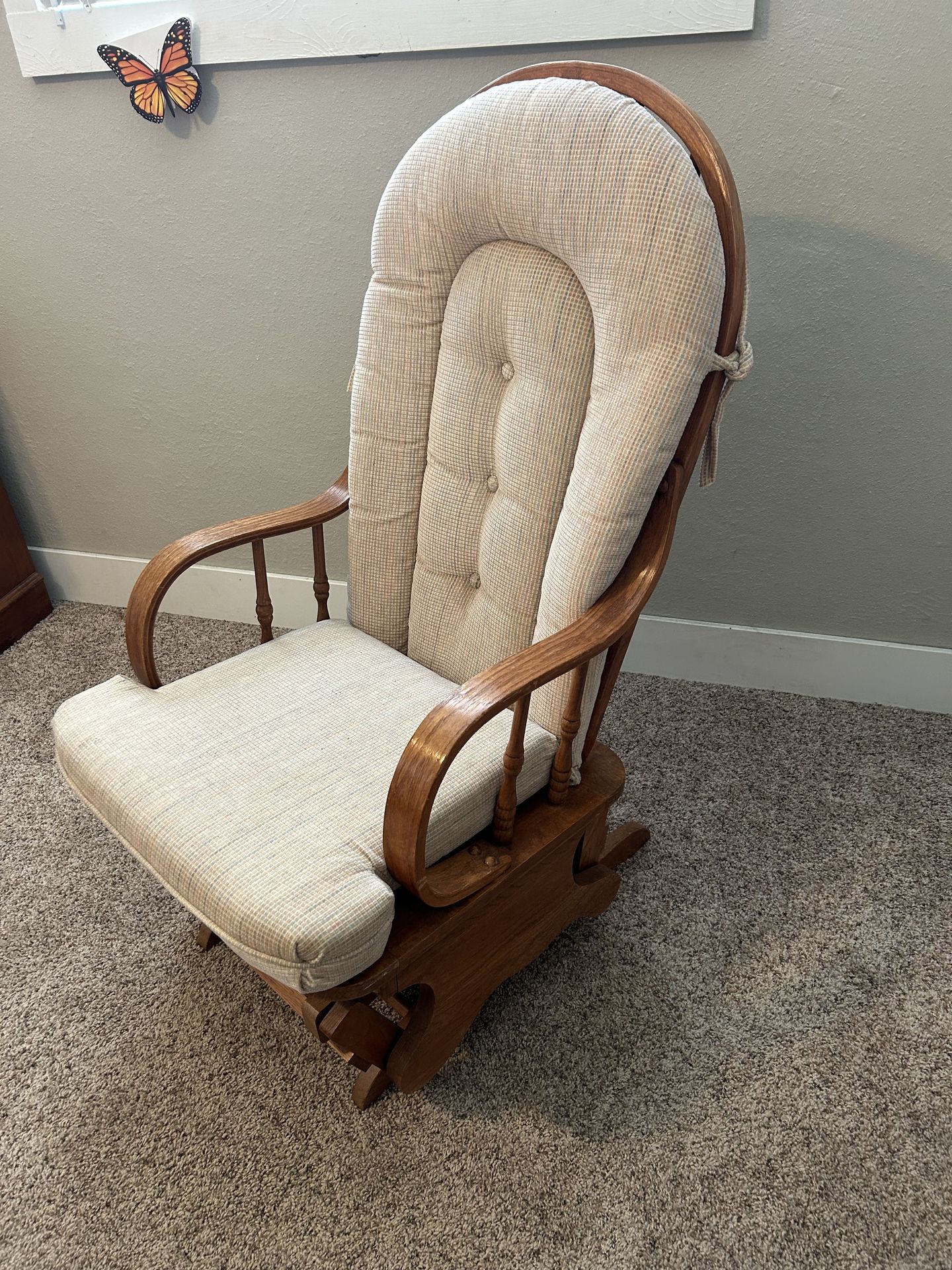 Slider rocking chair with matching pillow