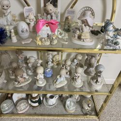  Precious Moment Figurine Collection. With Stand. 