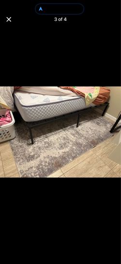 Never used - full size mattress and frame