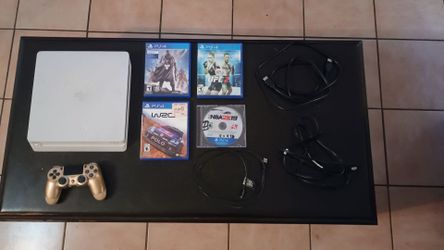 Sony ps4 slim white console with gold controller and games