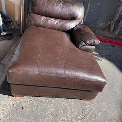 Brown leather lounge chair