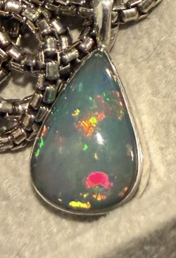 Beautiful Premium Opal With Stirling Silver, Case And Pouch. 