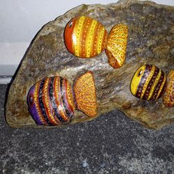 Painted Stones On Flagstone Base