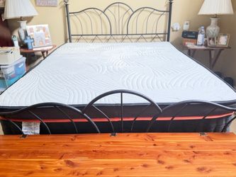 Queen size mattress (like new), headboard, footboard, and 14 in high heavy duty frame