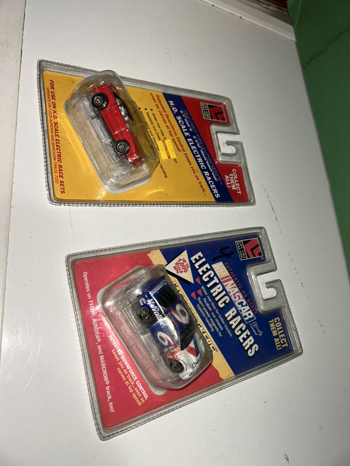 Pair Of new on the card HO Slot Cars