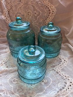 Pioneer Woman three-piece canister set/Cassie pattern in teal/turquoise